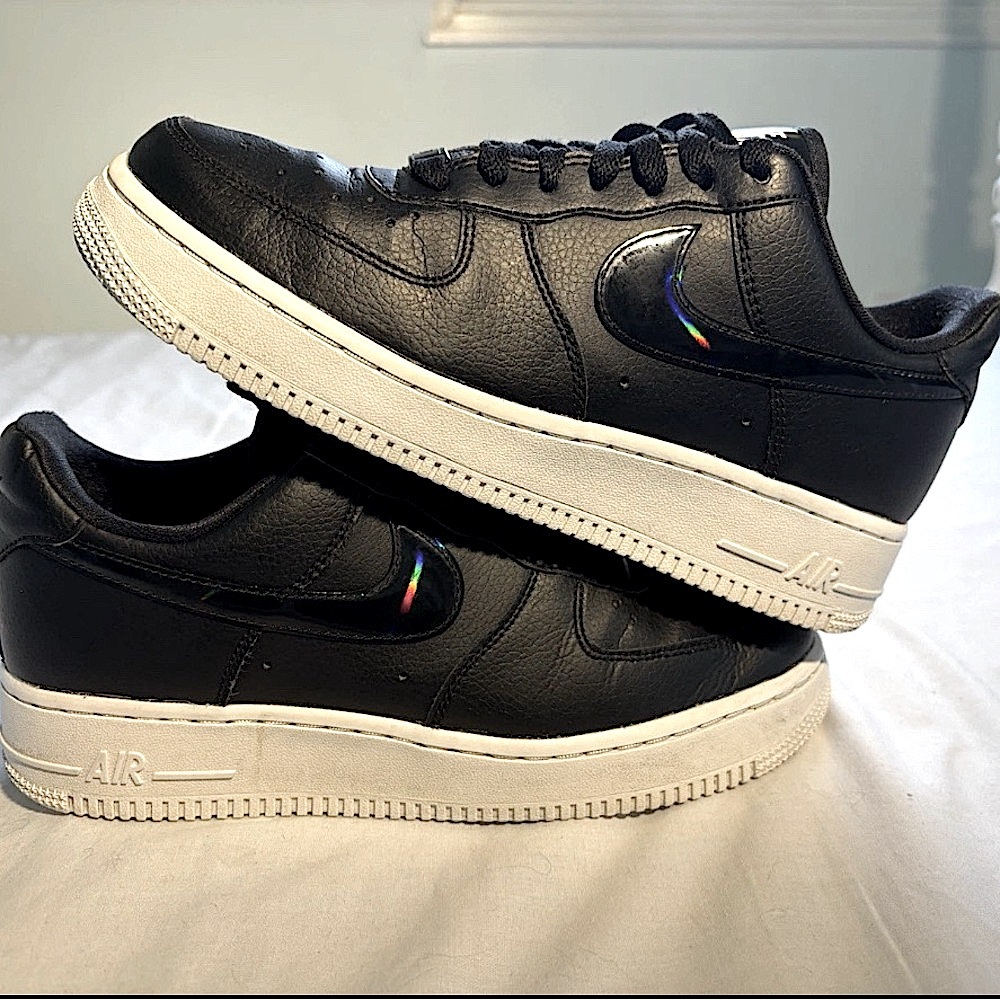 Nike Air Force 1 Lows black and white with patent leather swooshes
